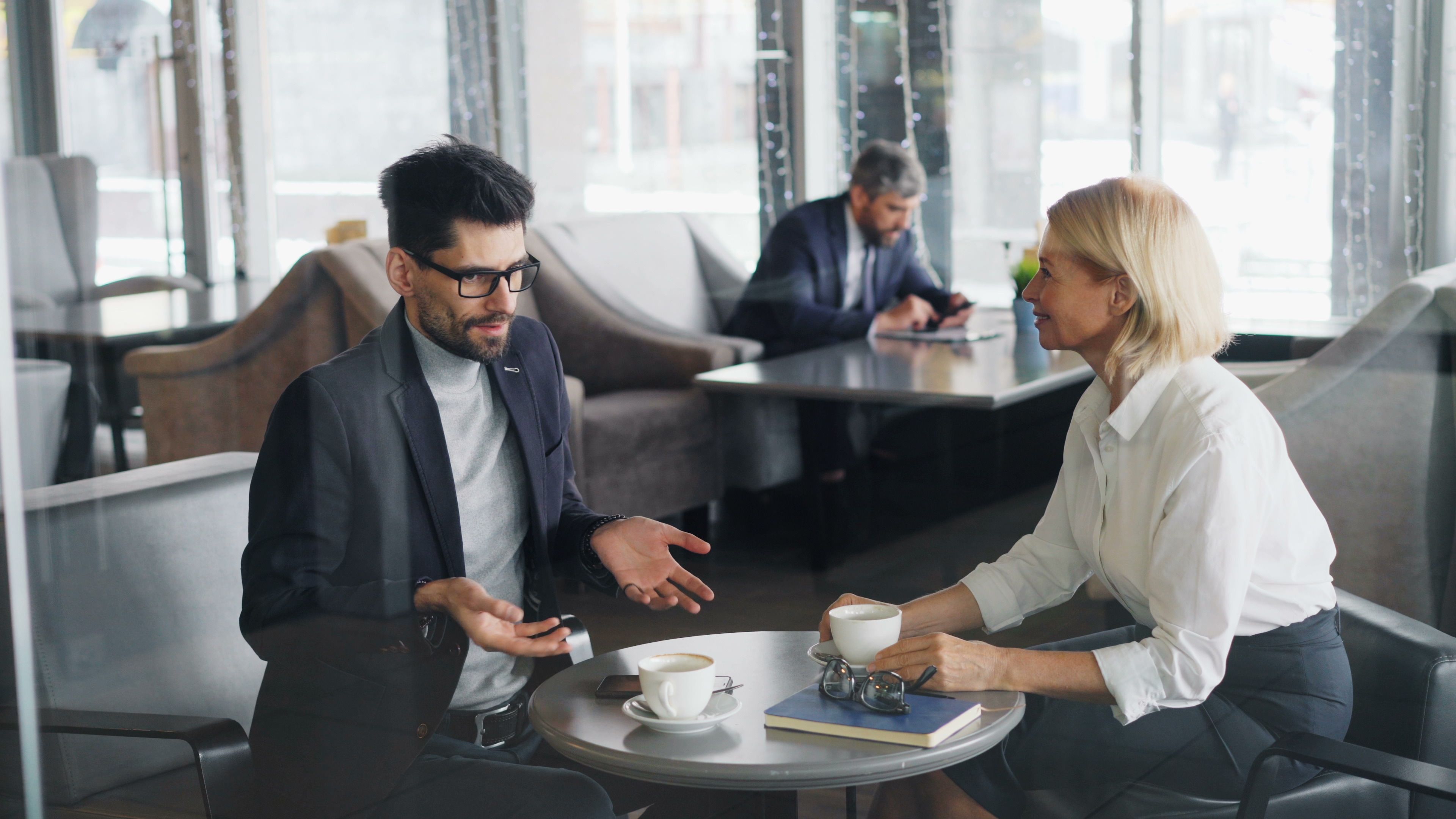 Two colleagues in conversation