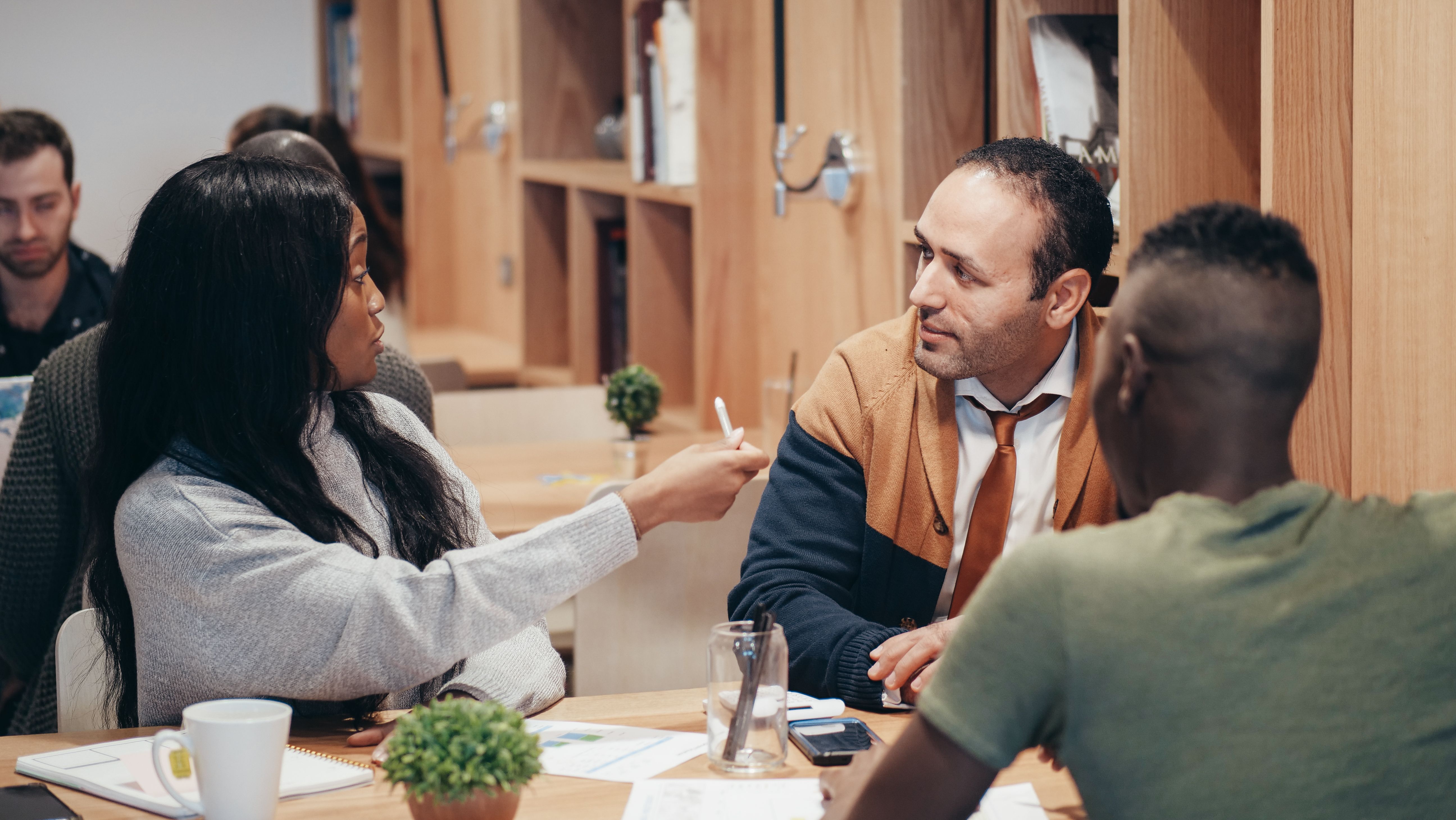 A benefits team in a working session